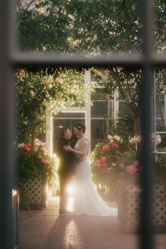 Couple reflected in a city window