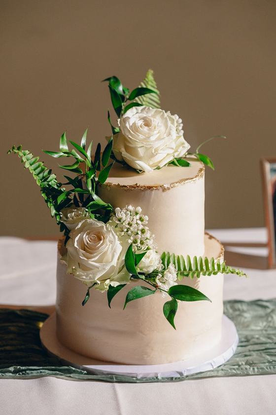 Wedding cake dressed with fresh ferns