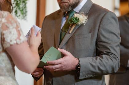 Handwritten vow book held open