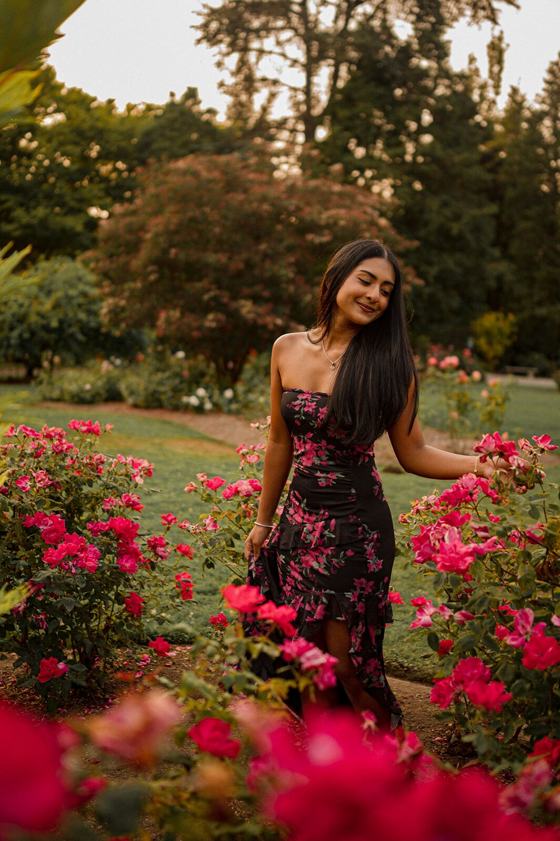 Portrait taken among the roses in full bloom
