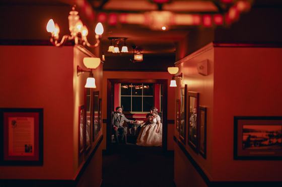 Reception hall washed in deep red light