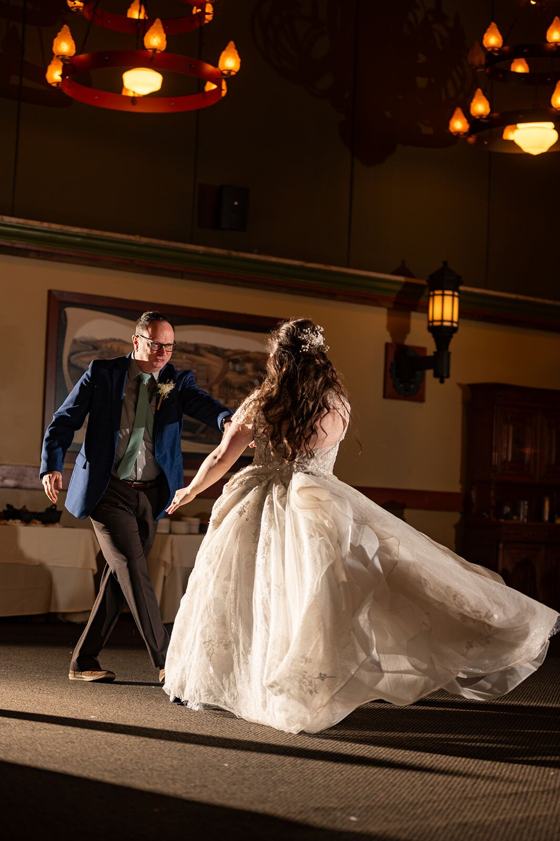 Dress train sweeping across the floor mid-dance