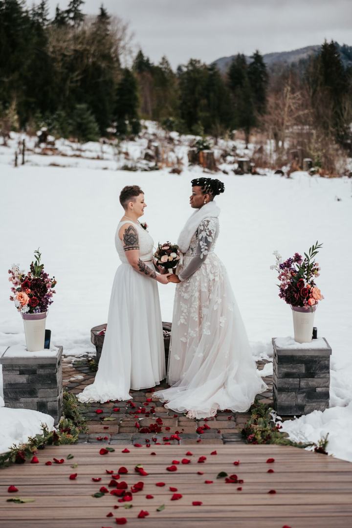 Couple exchanging vows on a snowy ridge