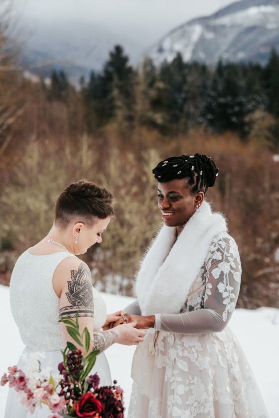 Rings exchanged with snow on the ground
